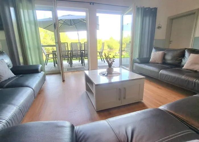 Deluxe, Direkt Am See, Mit Hauseigener Panorama Aussensauna, Zwei Badezimmern, Tretboot, Kamin, In Direkter Naehe Zum Kinderspieleparadies Sowie Reit- Und Ponyhof, 1 Bis 8 Personen Vakantiehuis